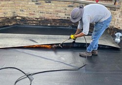 Heavy winds lifted up membrane reheated it back to shape